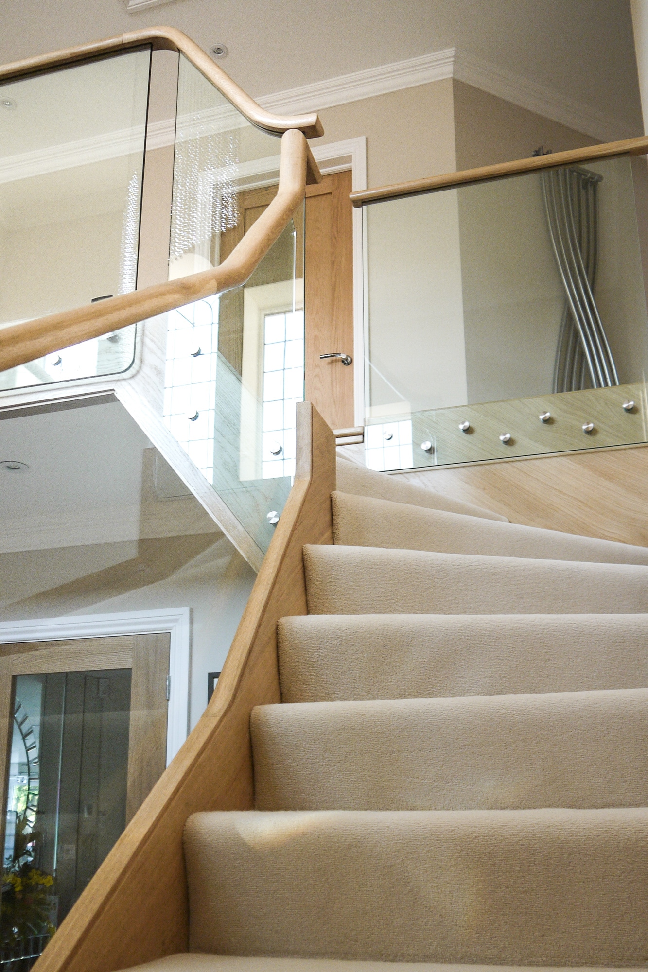 Custom wood and glass staircase in Leigh-on-Sea